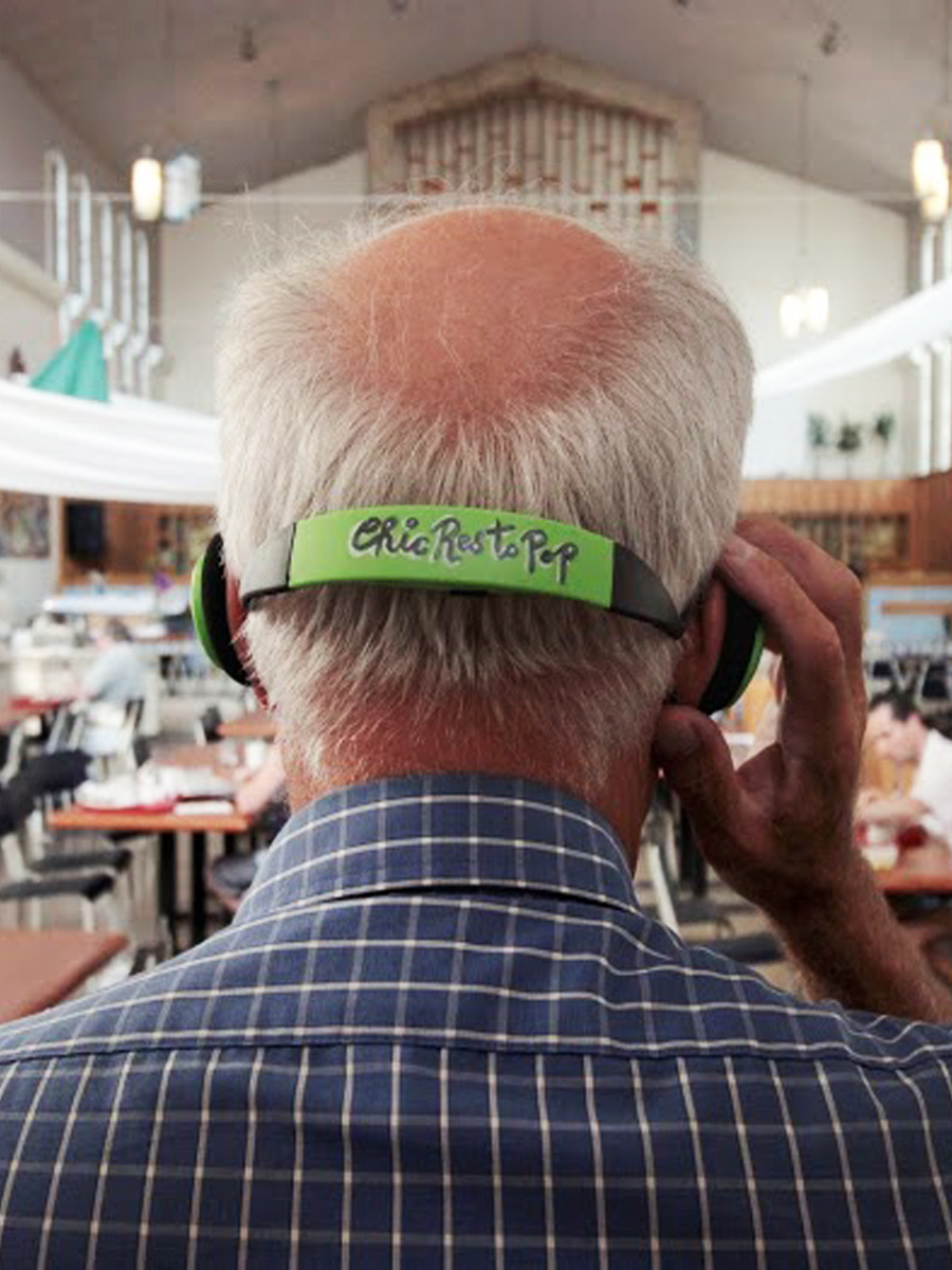 a participant listens to a sound installation at Le Chic Resto Pop